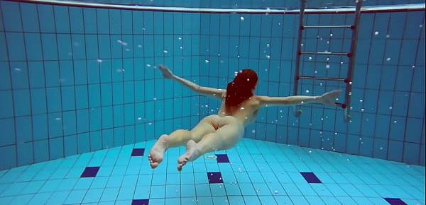  Big tits petite babe Deniska swimming in the pool